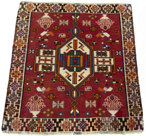 Surface texture of 2000s Shiraz rug with natural Wool and intricate pattern