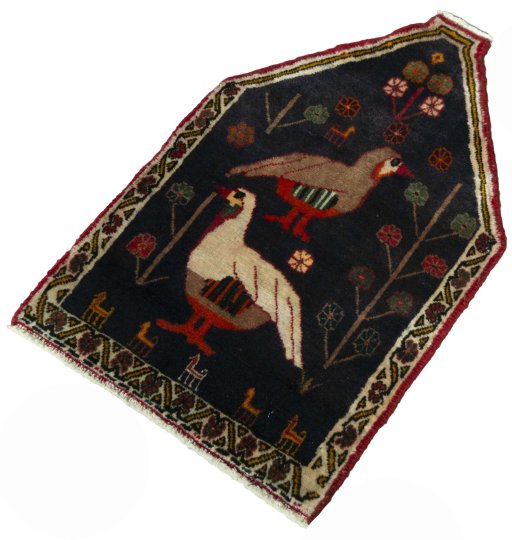 Corner detail of 2000s Shiraz rug showing border pattern and Wool pile