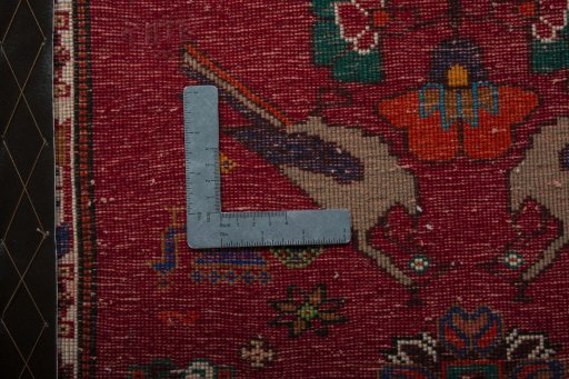 Backside of handmade 2000s Shiraz rug showing knot structure and weave density