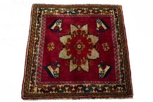 Surface texture of 2000s Shiraz rug with natural Wool and intricate pattern