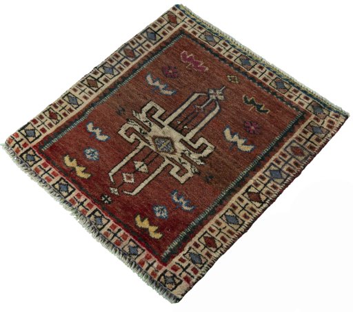 Corner detail of 2000s Shiraz rug showing border pattern and Wool pile