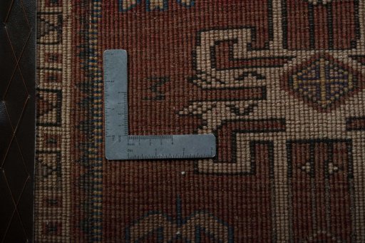 Backside of handmade 2000s Shiraz rug showing knot structure and weave density