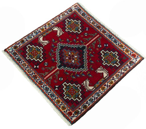 Corner detail of 2000s Shiraz rug showing border pattern and Wool pile