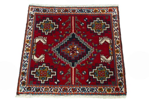Surface texture of 2000s Shiraz rug with natural Wool and intricate pattern
