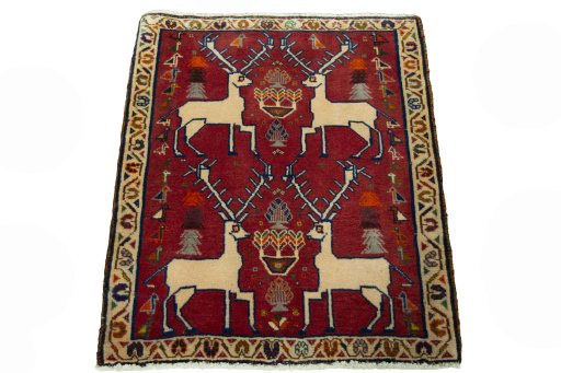 Surface texture of 2000s Shiraz rug with natural Wool and intricate pattern