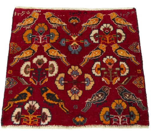 Surface texture of 2000s Shiraz rug with natural Wool and intricate pattern