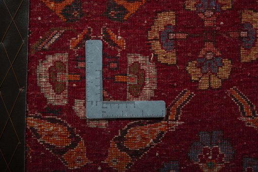 Backside of handmade 2000s Shiraz rug showing knot structure and weave density