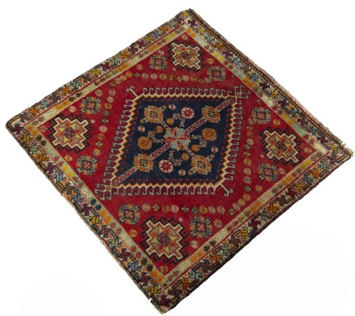 Corner detail of 2000s Shiraz rug showing border pattern and Wool pile