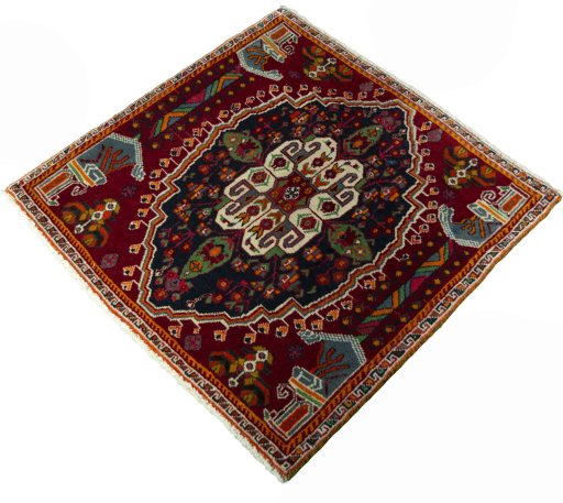 Corner detail of 2000s Shiraz rug showing border pattern and Wool pile