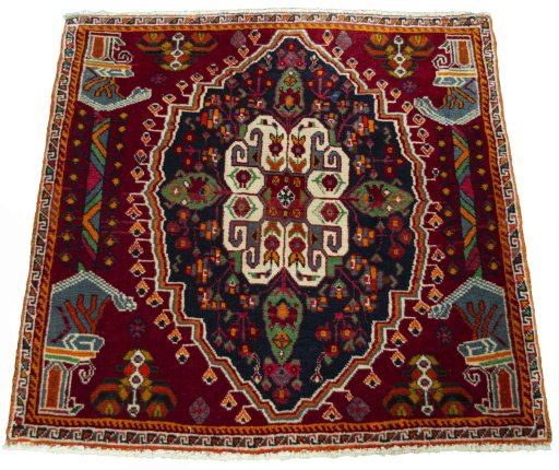 Surface texture of 2000s Shiraz rug with natural Wool and intricate pattern