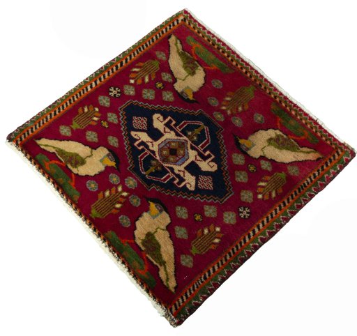 Corner detail of 2000s Shiraz rug showing border pattern and Wool pile