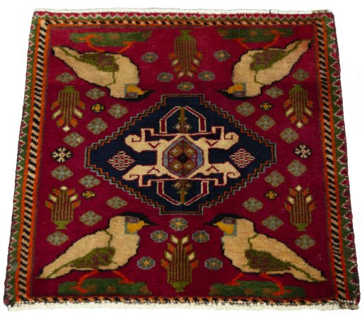 Surface texture of 2000s Shiraz rug with natural Wool and intricate pattern