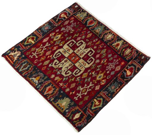 Corner detail of 2000s Shiraz rug showing border pattern and Wool pile