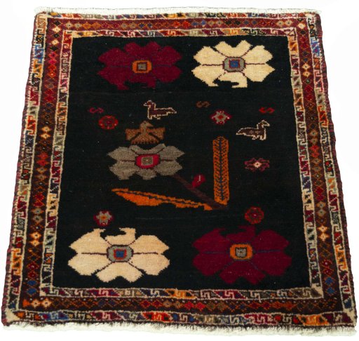 Surface texture of 2000s Shiraz rug with natural Wool and intricate pattern