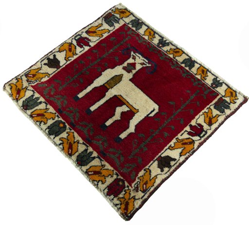 Corner detail of 2000s Shiraz rug showing border pattern and Wool pile