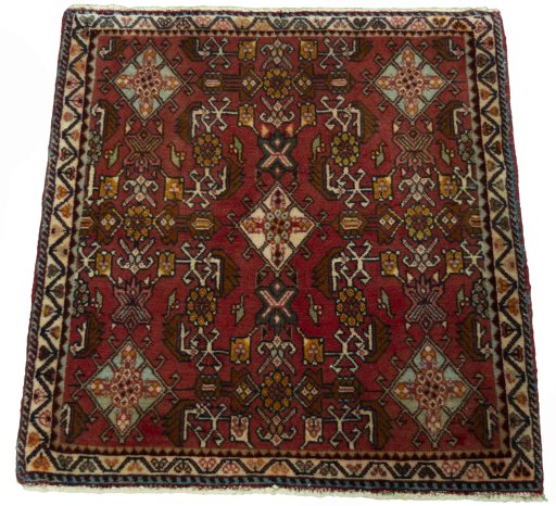 Surface texture of 2000s Shiraz rug with natural Wool and intricate pattern