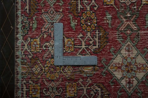 Backside of handmade 2000s Shiraz rug showing knot structure and weave density
