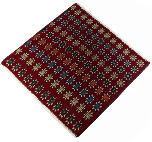 Corner detail of 2000s Shiraz rug showing border pattern and Wool pile
