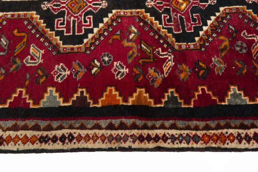 Close-up detail of 2000s Shiraz rug from Iran / Persia showing Wool weave