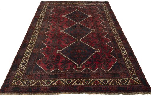 Surface texture of 2000s Shiraz rug with natural Wool and intricate pattern