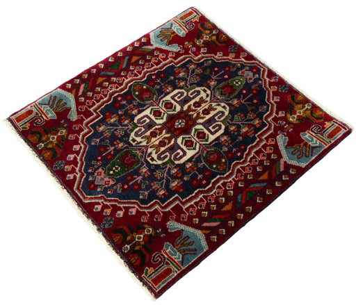 Corner detail of 2000s Shiraz rug showing border pattern and Wool pile