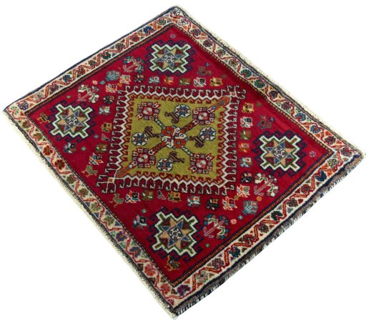 Corner detail of 2000s Shiraz rug showing border pattern and Wool pile