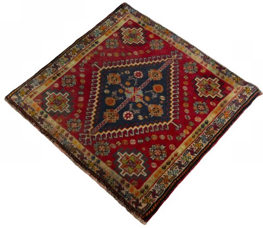 Corner detail of 2000s Shiraz rug showing border pattern and Wool pile
