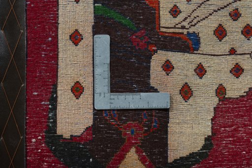 Backside of handmade 2000s Shiraz rug showing knot structure and weave density