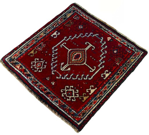 Corner detail of 2000s Shiraz rug showing border pattern and Wool pile