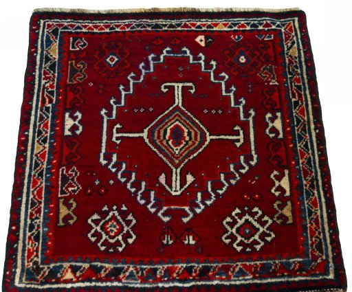 Surface texture of 2000s Shiraz rug with natural Wool and intricate pattern