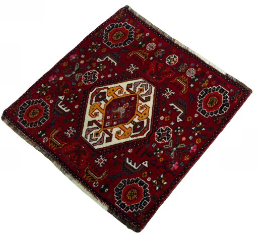 Corner detail of 2000s Shiraz rug showing border pattern and Wool pile