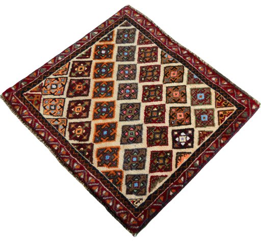 Corner detail of 2000s Shiraz rug showing border pattern and Wool pile