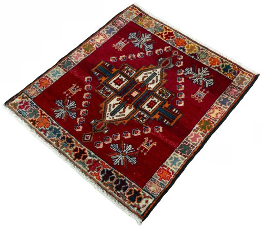Corner detail of 2000s Shiraz rug showing border pattern and Wool pile
