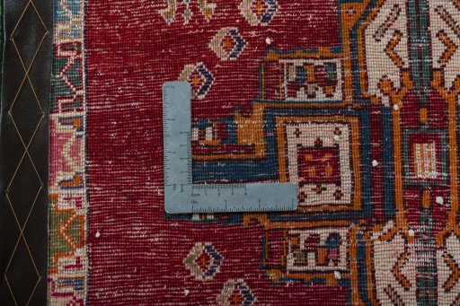 Backside of handmade 2000s Shiraz rug showing knot structure and weave density