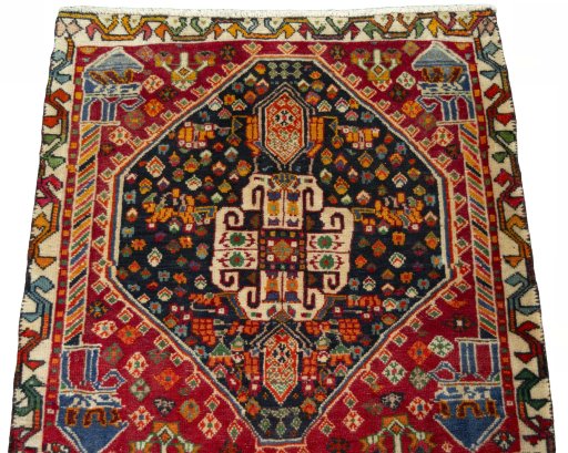 Surface texture of 2000s Shiraz rug with natural Wool and intricate pattern