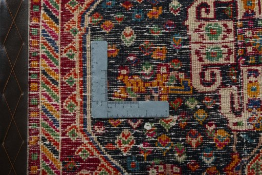 Backside of handmade 2000s Shiraz rug showing knot structure and weave density