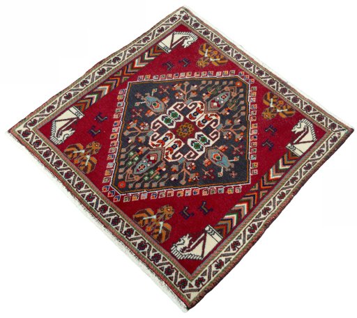 Corner detail of 2000s Shiraz rug showing border pattern and Wool pile