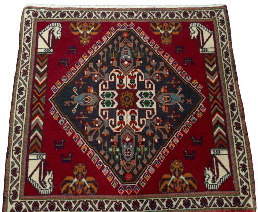 Surface texture of 2000s Shiraz rug with natural Wool and intricate pattern