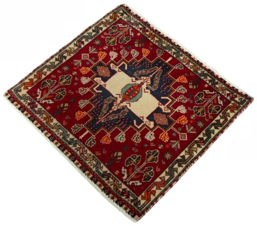 Corner detail of 2000s Shiraz rug showing border pattern and Wool pile