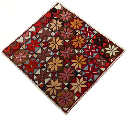 Corner detail of 2000s Shiraz rug showing border pattern and Wool pile