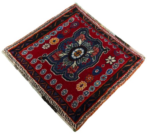 Corner detail of 2000s Shiraz rug showing border pattern and Wool pile