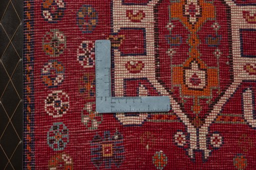 Backside of handmade 2000s Shiraz rug showing knot structure and weave density