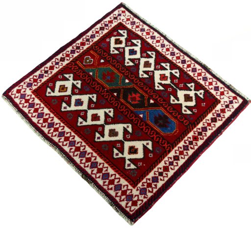 Corner detail of 2000s Shiraz rug showing border pattern and Wool pile