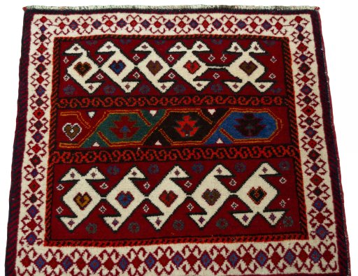 Surface texture of 2000s Shiraz rug with natural Wool and intricate pattern