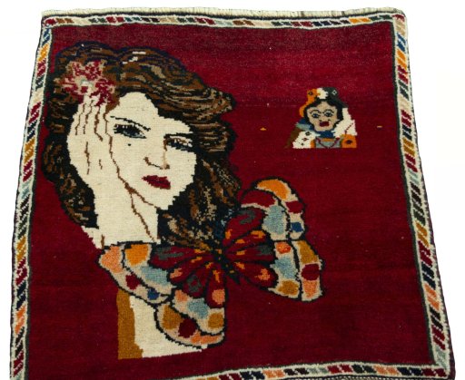 Surface texture of 2000s Shiraz rug with natural Wool and intricate pattern