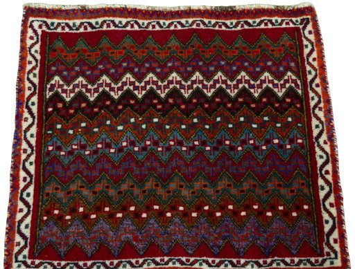 Surface texture of 2000s Shiraz rug with natural Wool and intricate pattern