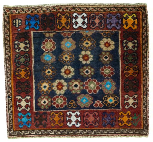 Full view of 2000s Shiraz rug from Iran / Persia, 59 × 65 cm in Red tones