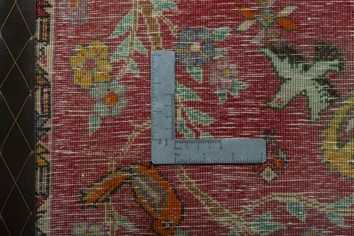 Backside of handmade 2000s Shiraz rug showing knot structure and weave density