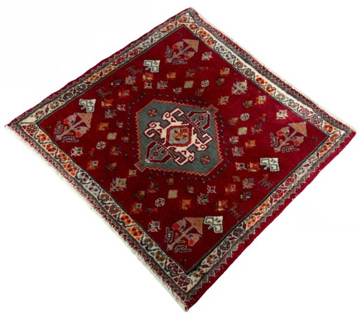 Corner detail of 2000s Shiraz rug showing border pattern and Wool pile