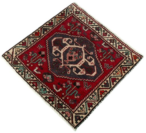 Corner detail of 2000s Shiraz rug showing border pattern and Wool pile
